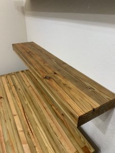 Floating shelf from reclaimed lumber